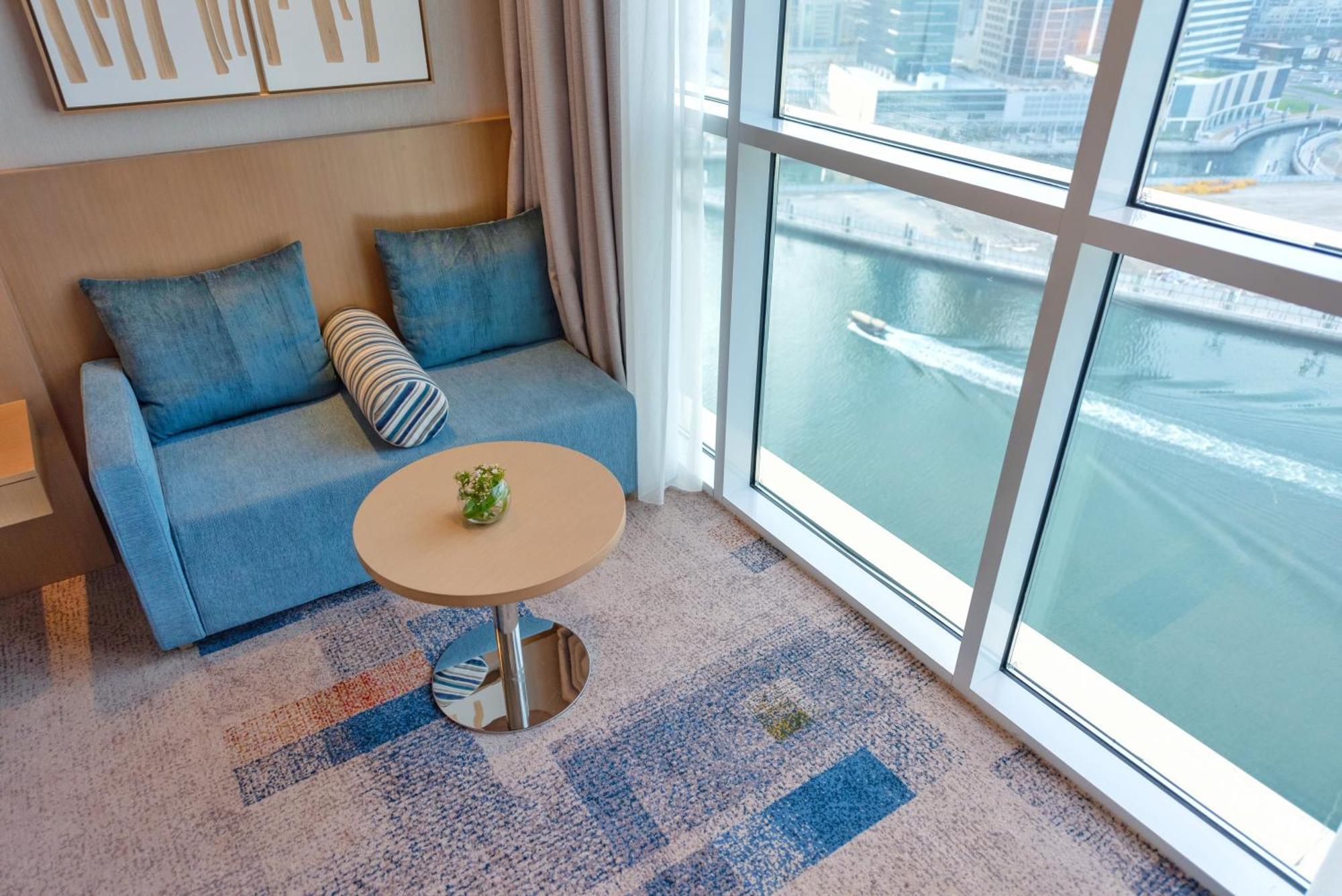 Chambre Premium avec Accès Gratuit à la Plage Privée de l'Hôtel sur l’Île de Palm Jumeirah - Vue sur Canal de Dubaï