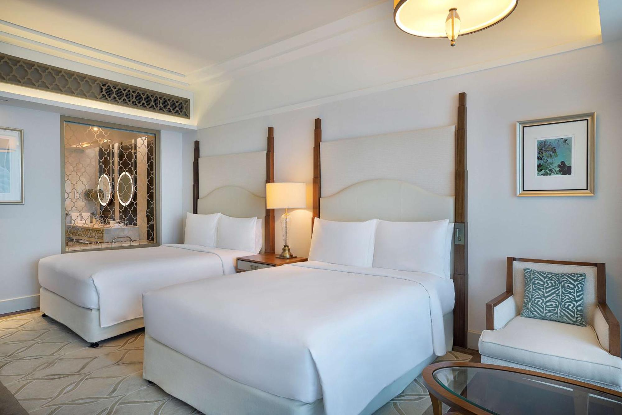 Deluxe Kamer met 2 Queensize Bedden en Uitzicht op de Palmzee