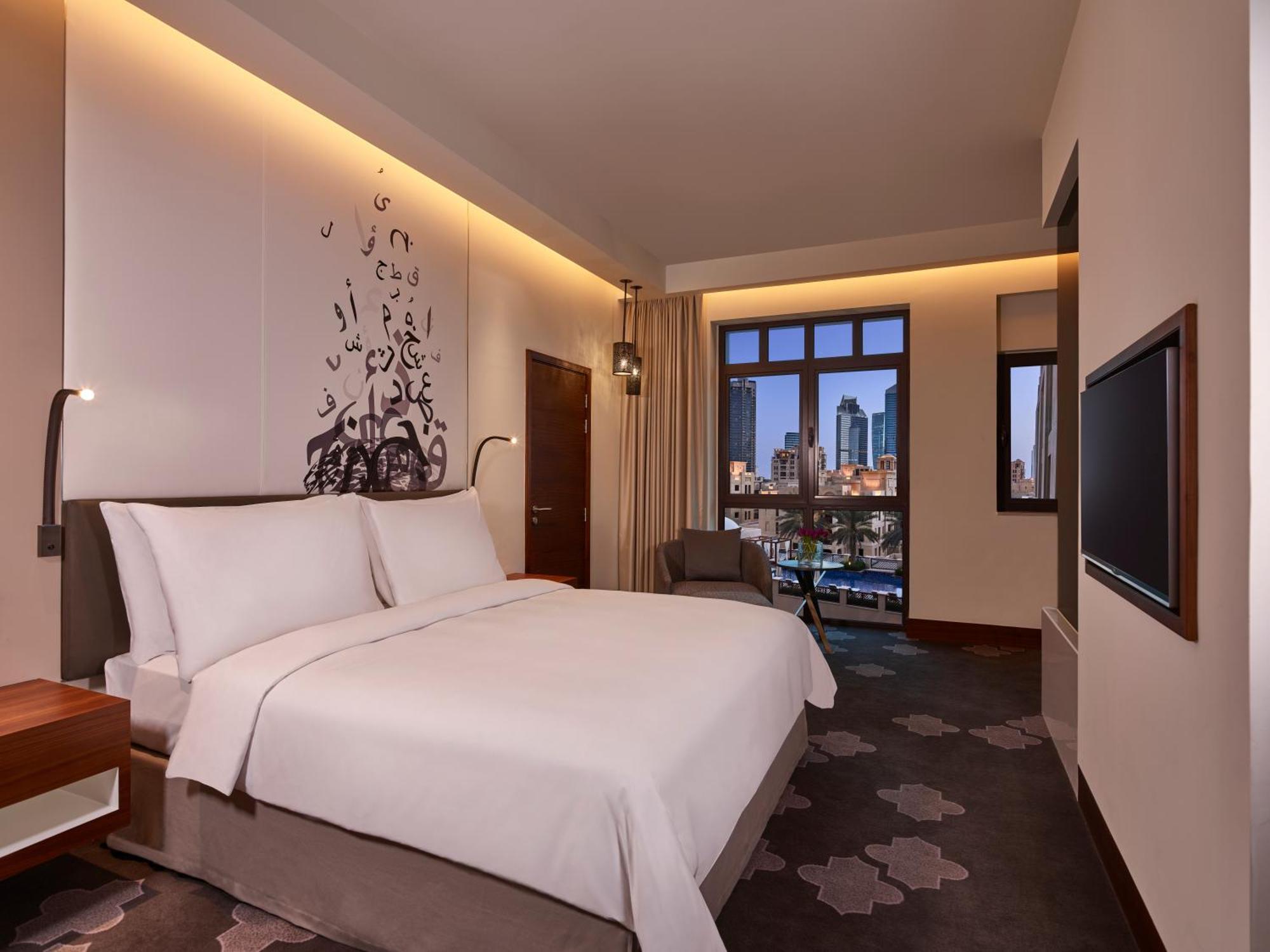 Quarto King Deluxe com Vista Piscina