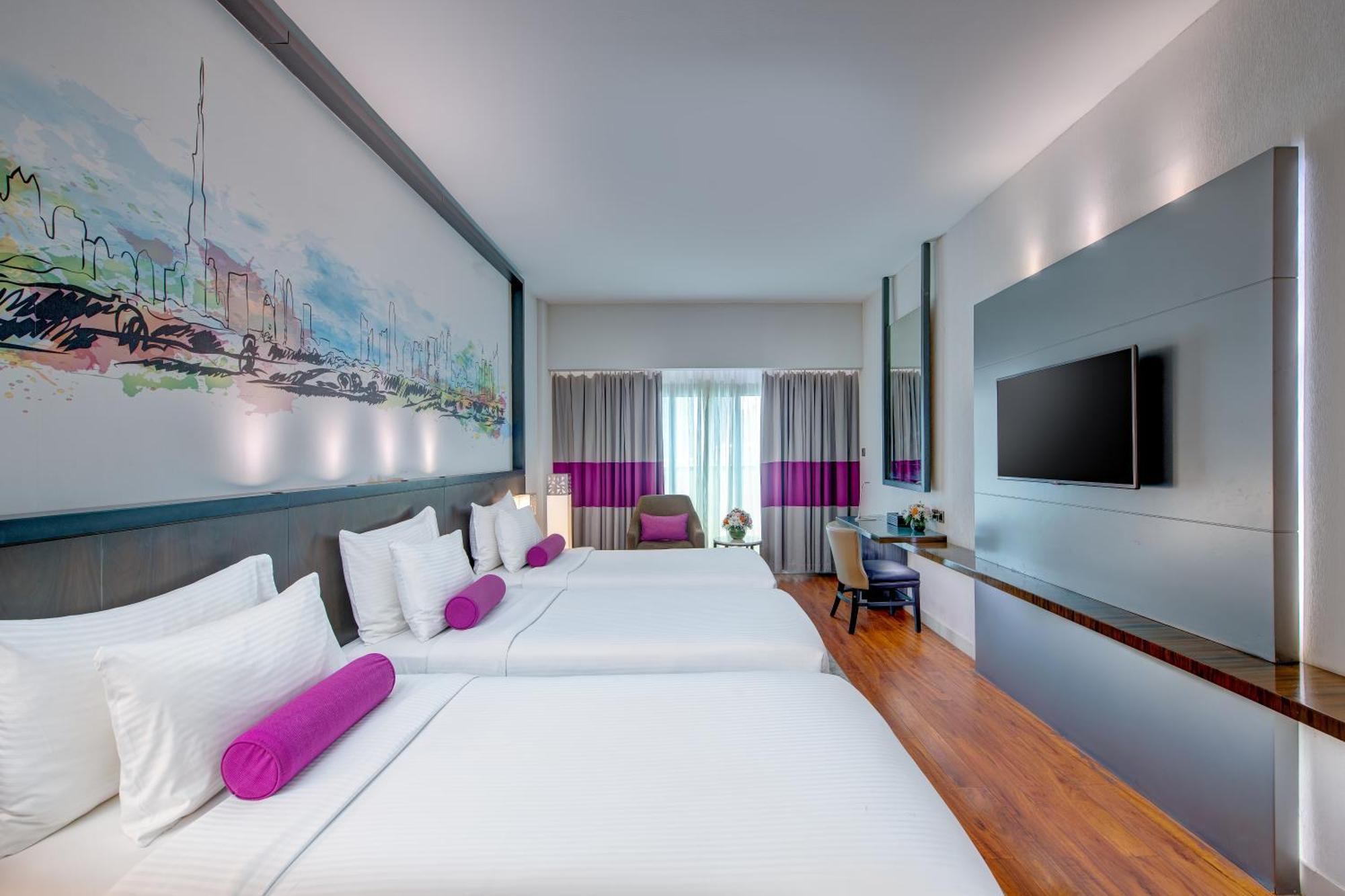 Quarto Familiar Executivo com 3 Camas Individuais - Não Fumadores