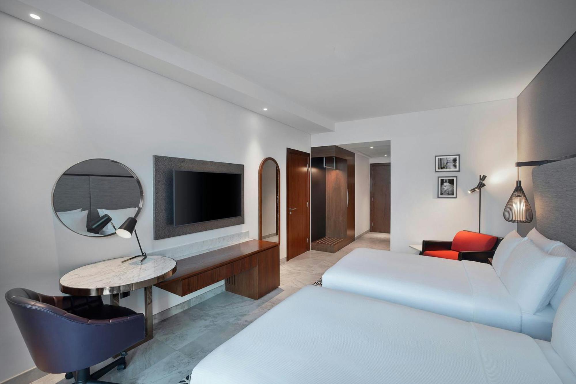 Quarto Deluxe com 2 Camas de Solteiro e Varanda